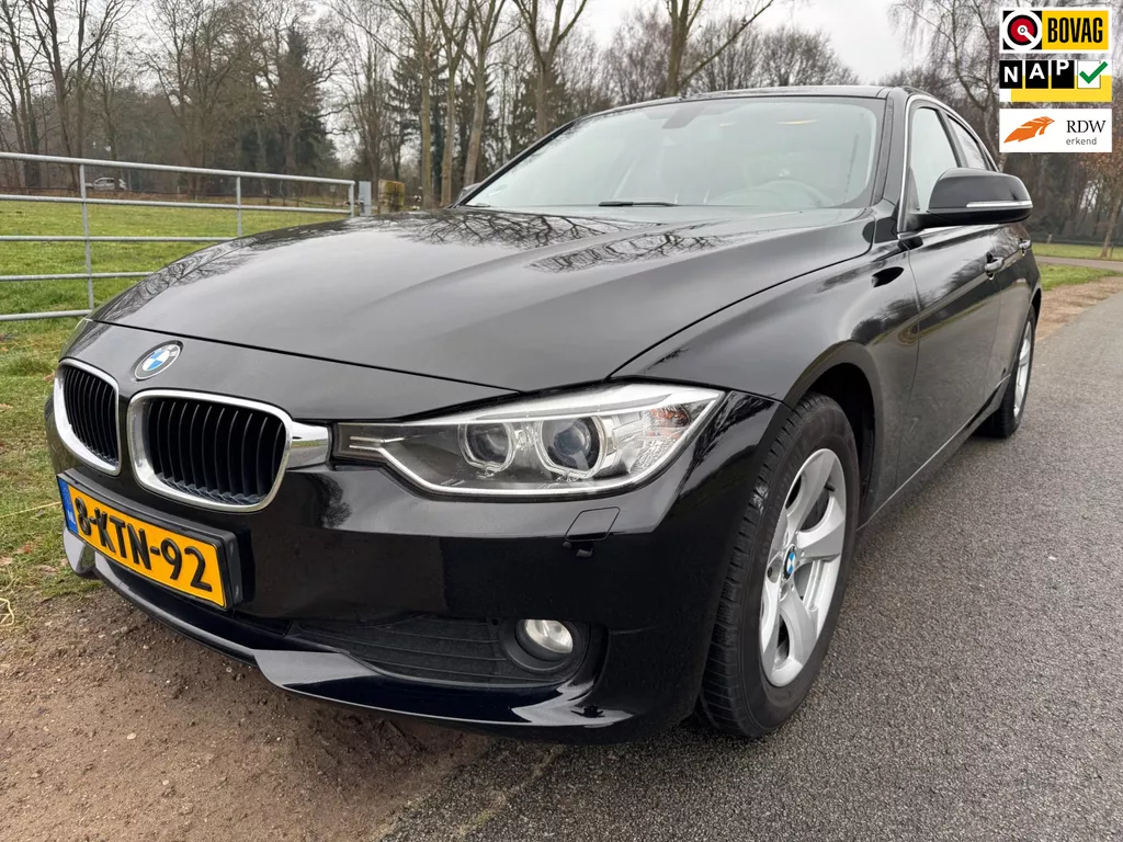 BMW 3-serie 320i EfficientDynamics Edition Business 2de eigenaar met navigatie en trekhaak