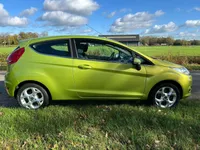 Ford Fiesta 1.25 Titanium trekhaak airco en zeer netjes Foto